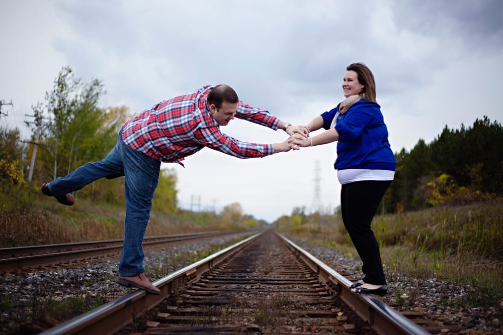 Cornwall engagement session - man falling off train track