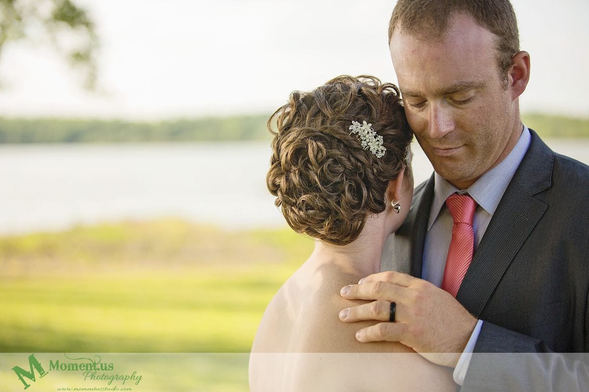 Outdoor Cornwall Wedding - groom touching bride's shoulder