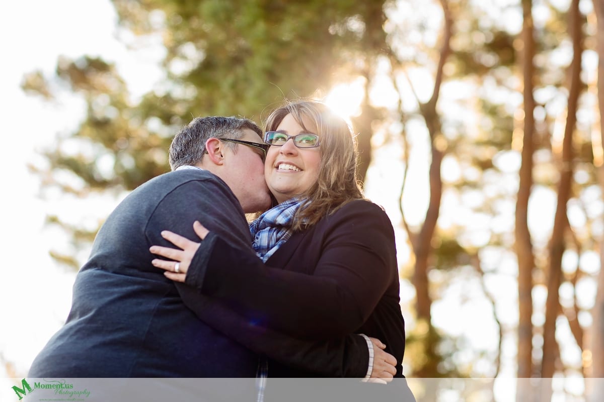 Moment.us Photography - Cornwall Family Photos - cuddle in cold weather