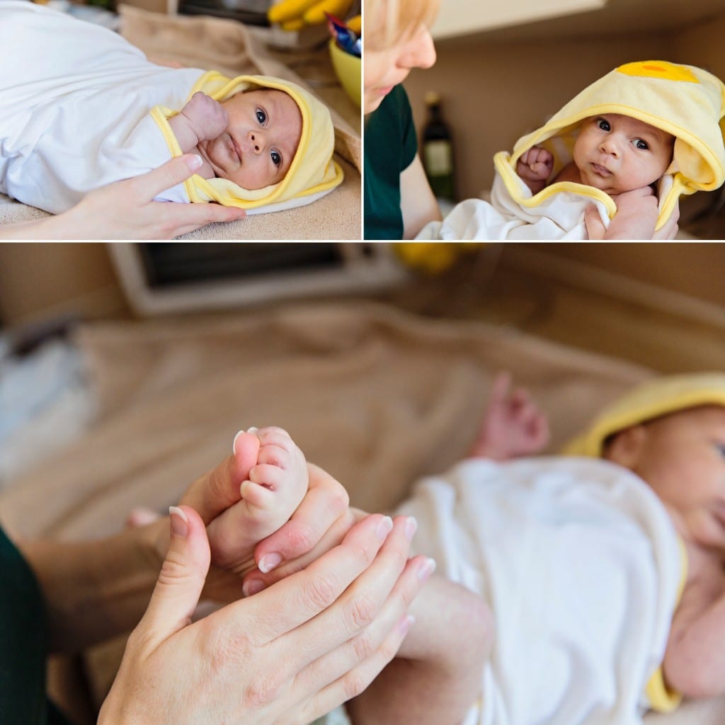 Cornwall documentary family photographer - baby in duck towel