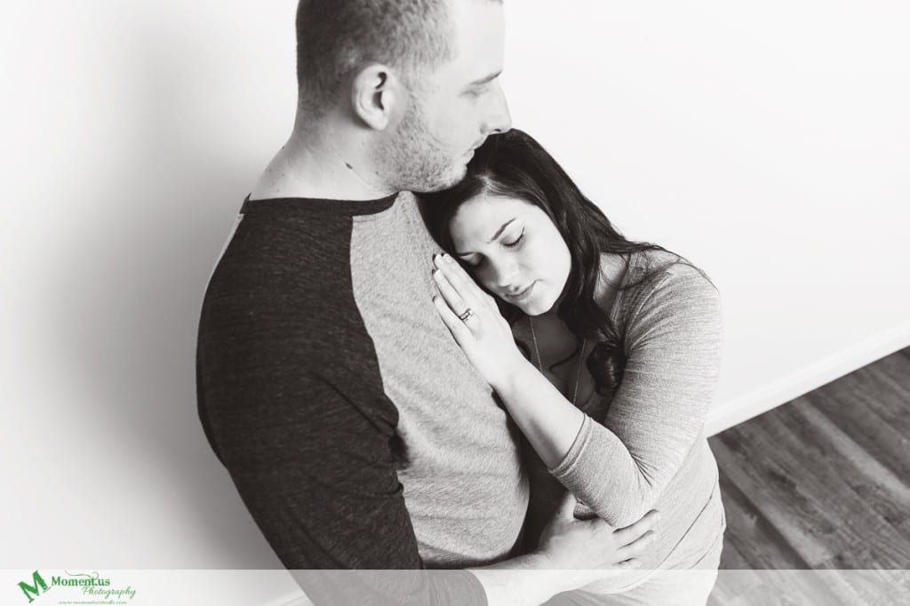 Maternity photography in Cornwall - woman's hand on husband's chest