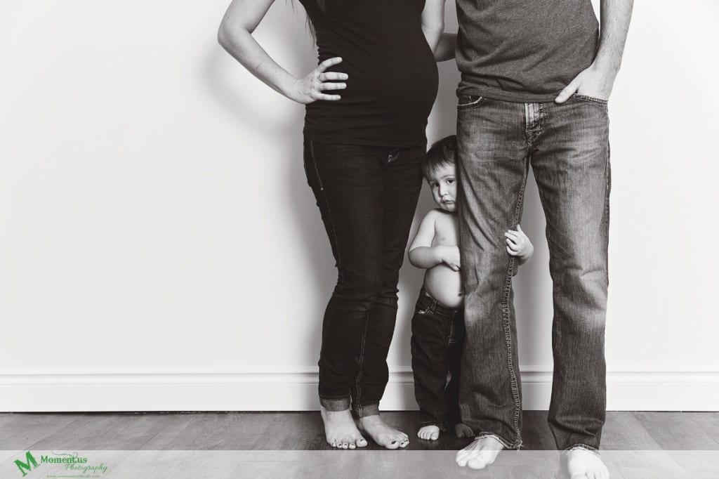 Maternity photography in Cornwall - boy holding legs