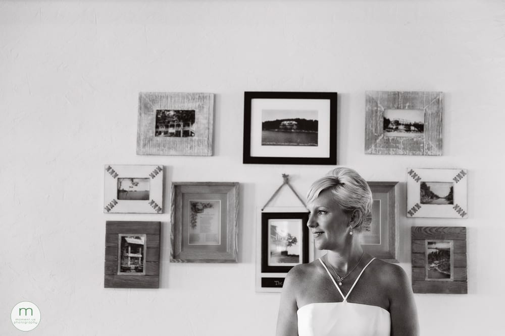 bride portrait in front of frames