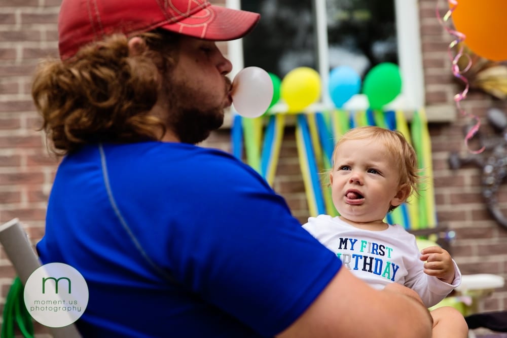 boy looking at bubblegum bubble