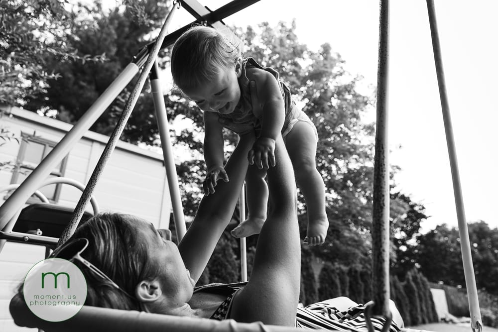 boy playing with mom on sqing