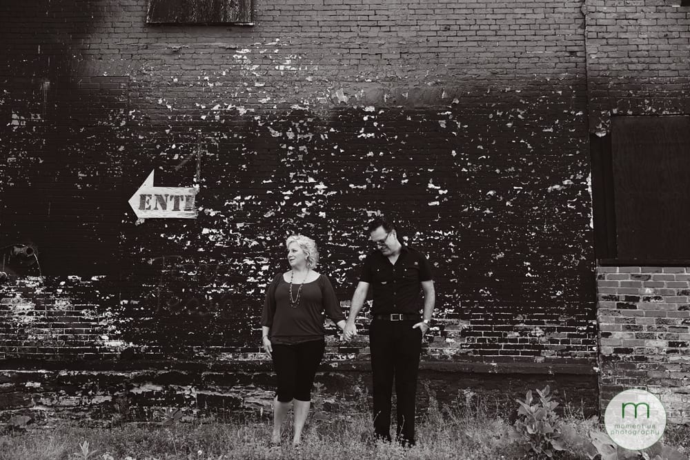 wan and woman under Enter sign