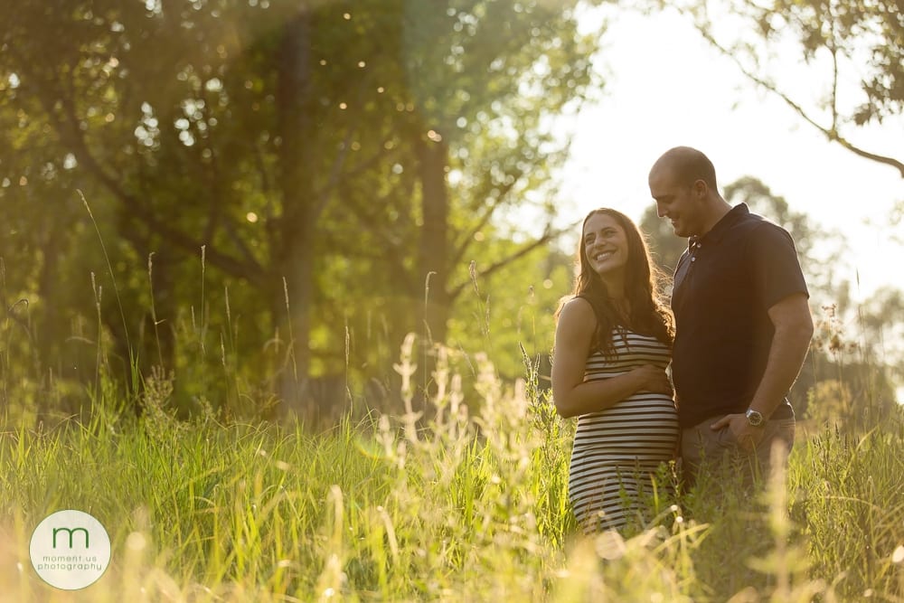 pregnant woman looking over shoulder