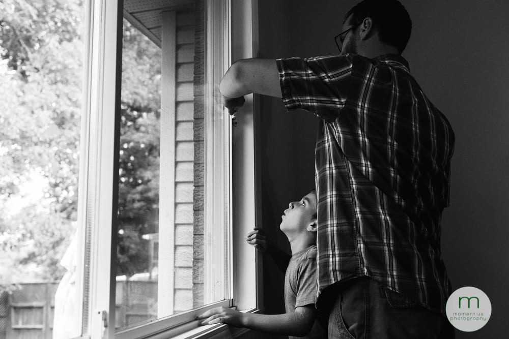 Cornwall Documentary Family Photography - Osborne 2boy struggling to open window
