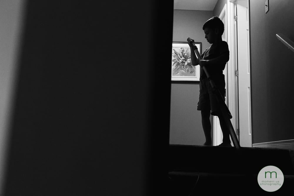 Cornwall Documentary Family Photography - boy with vaccum