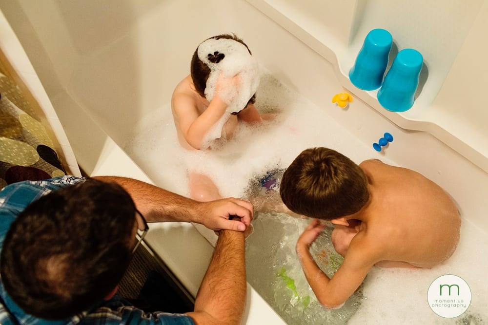 boys playing in tub