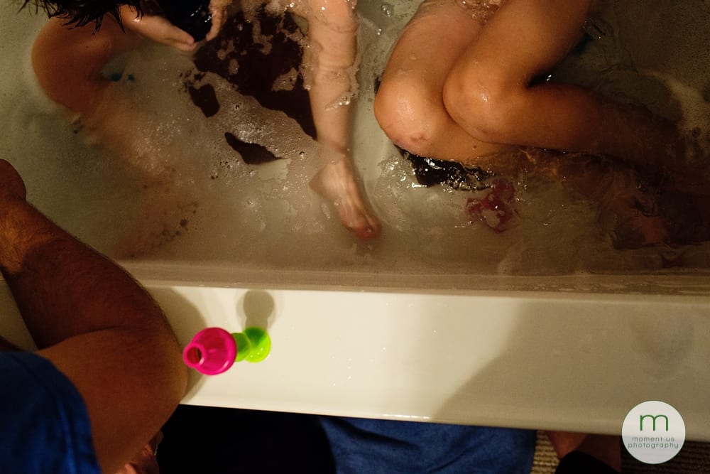 boys' legs in bathtub