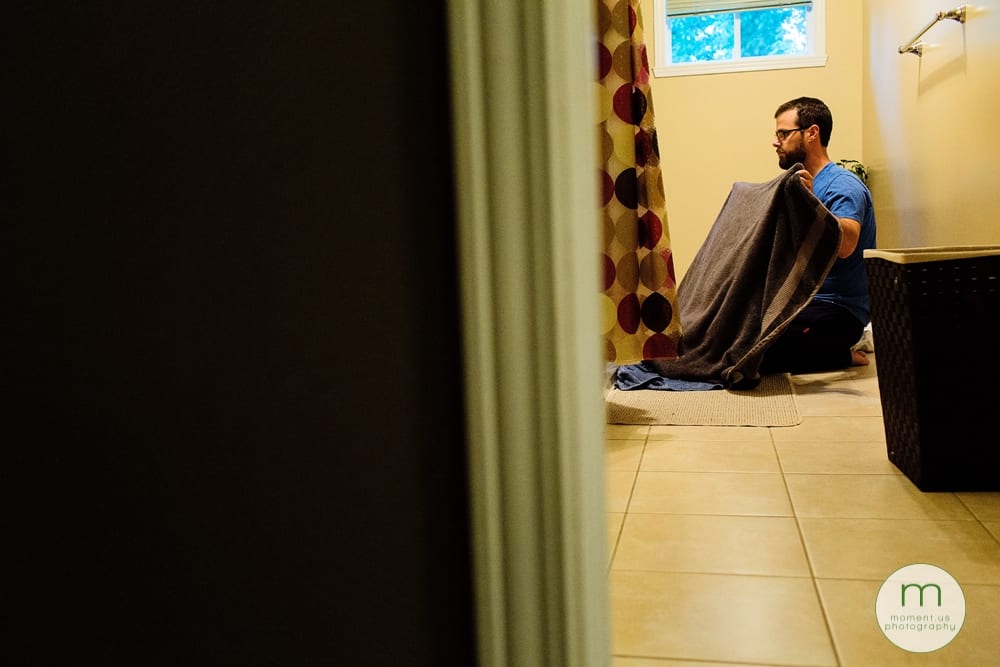 dad holding bath towel