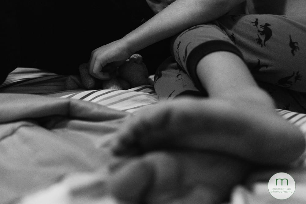 playing with stuffed animal