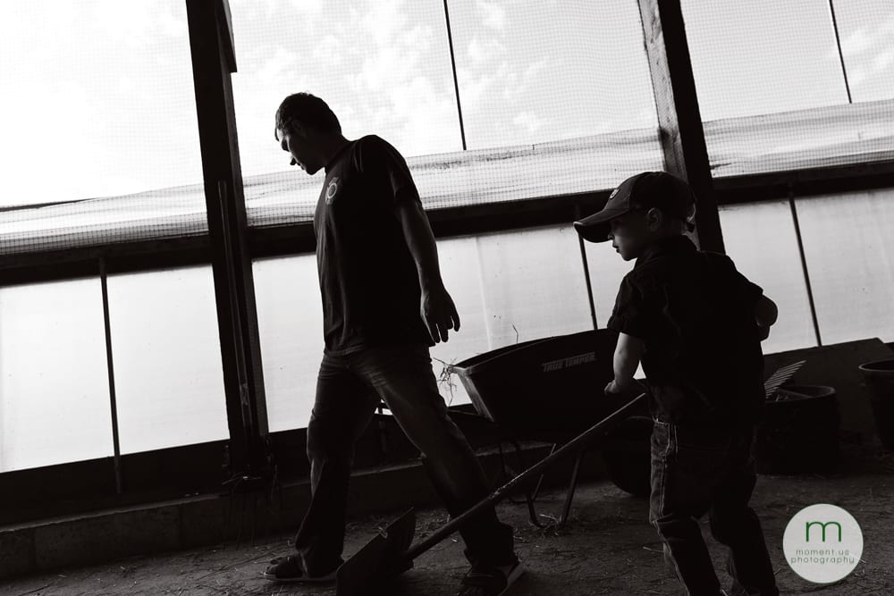 boy with shovel and dad