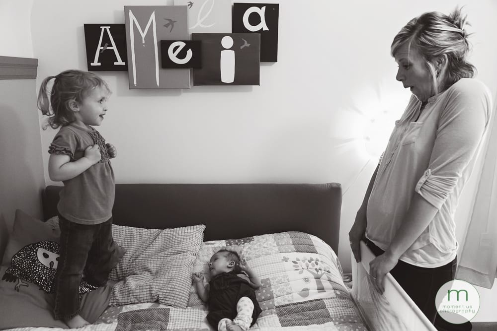 girl and mother with baby