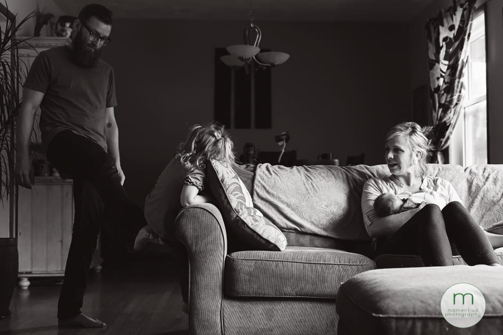 girl climbing up on couch
