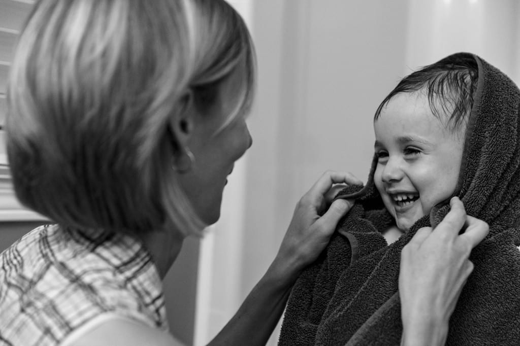 Cornwall boy getting dried off after bath