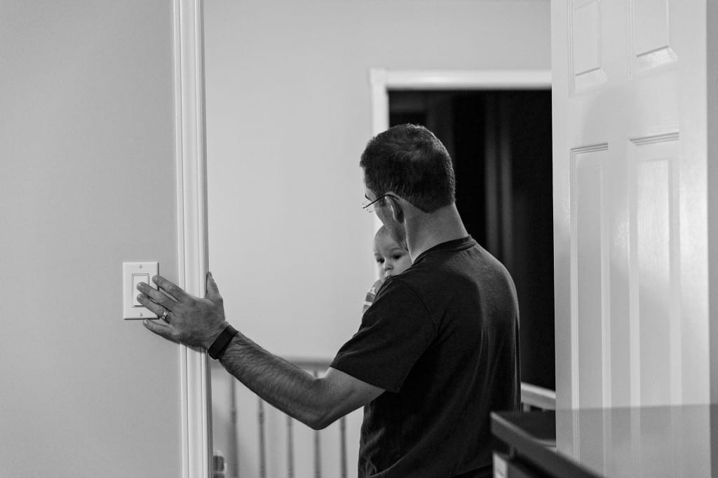 Dad turning off light