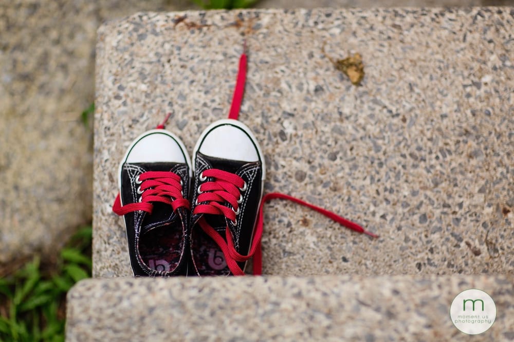 kids' shoes on step