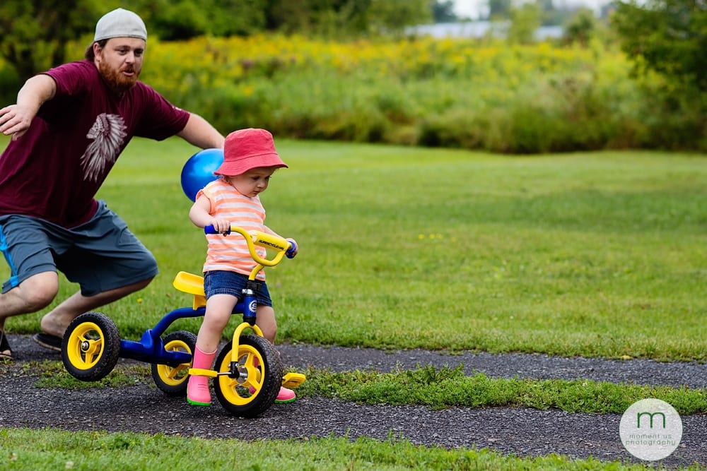girl tipping bike over