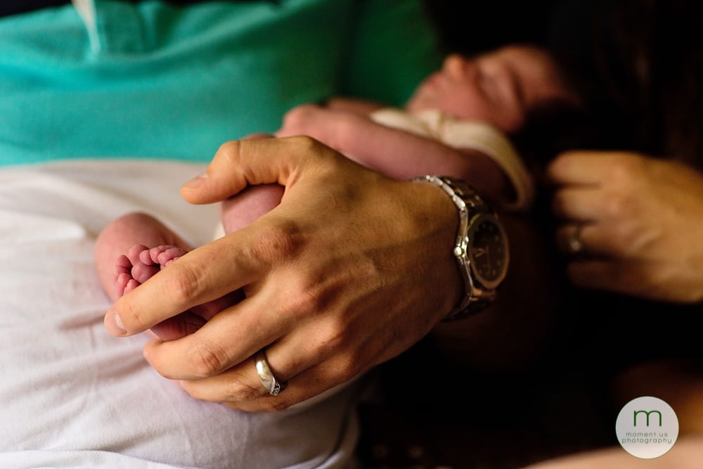 Cornwall dad holding baby's foot