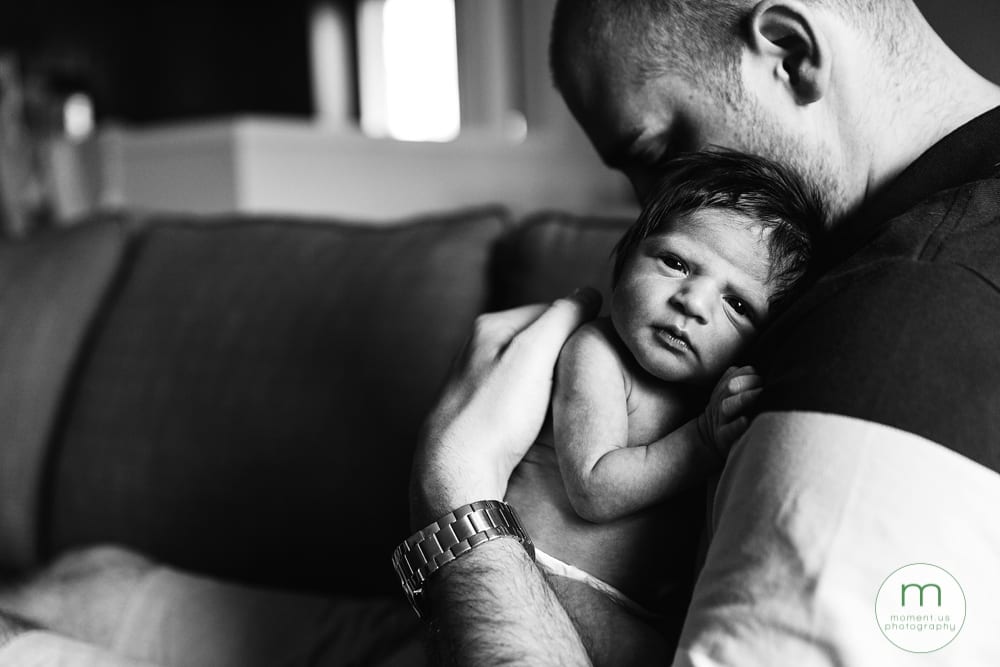 Dad with daughter on couch