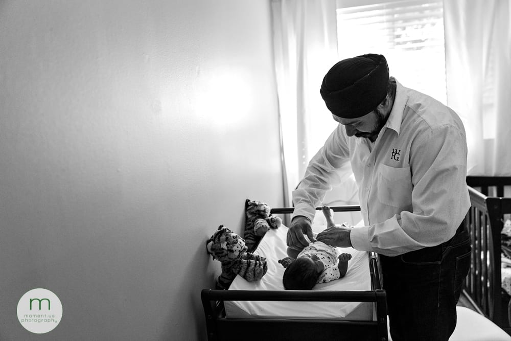 Brossard dad changing baby