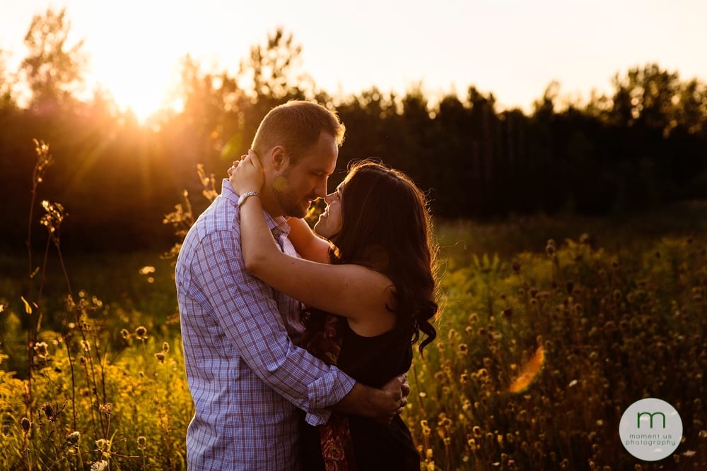 couple looking at each other in sunlight