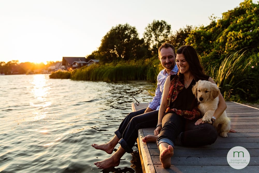 Cornwall couple sitting with dog on fock