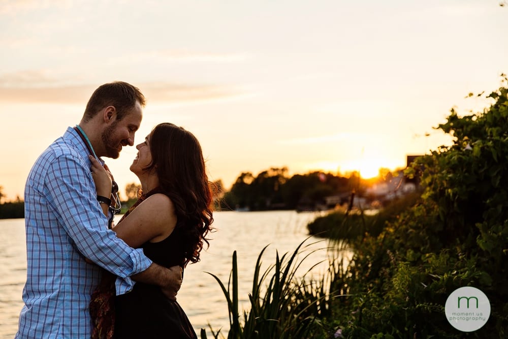 Couple cuddling in sunset