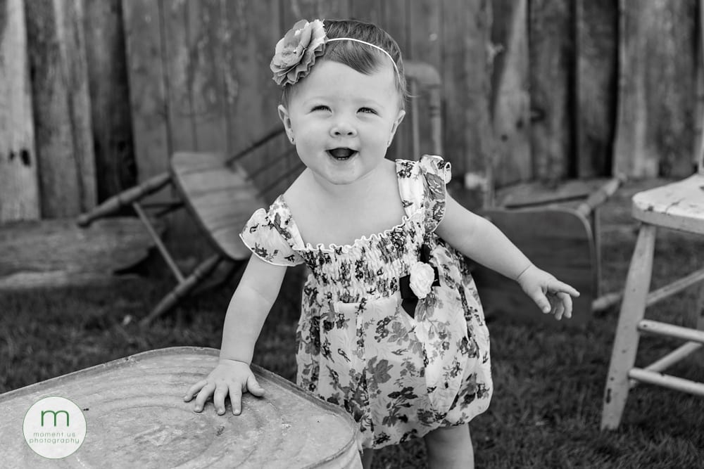 Girl standing by washtub