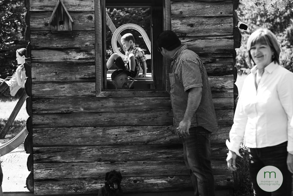 Cornwall families playing in playhouse