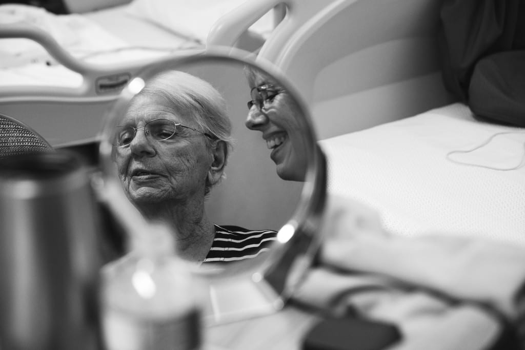 woman and daughter in mirror