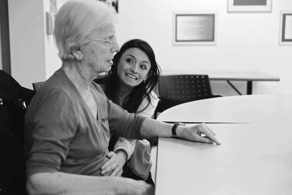 therapist touching patient's stomach