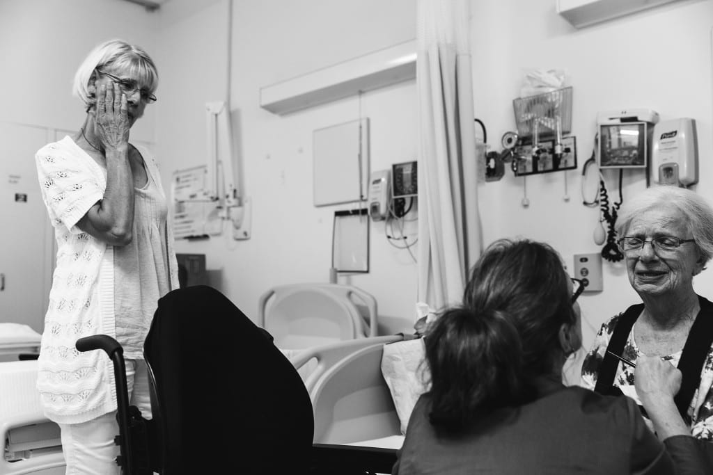 therapist talking to crying patient