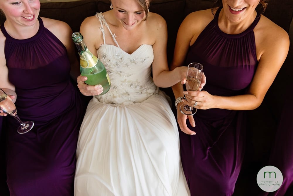 bride pouring champagne