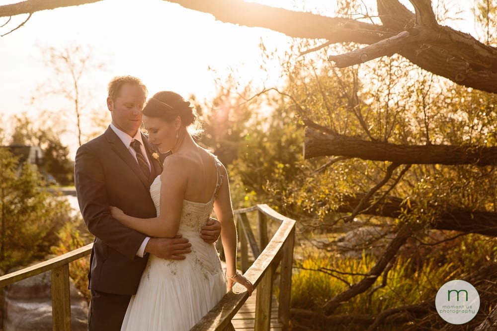 bride and groom on wooden boardwalk