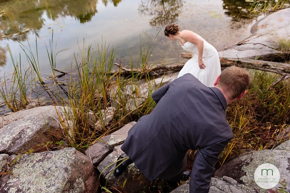 groom climbing down rocks