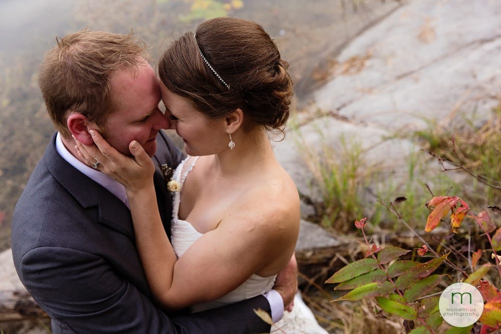 bride holding groom's face