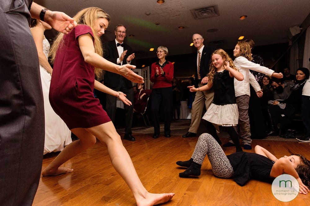 girl lying on back on dancefloor