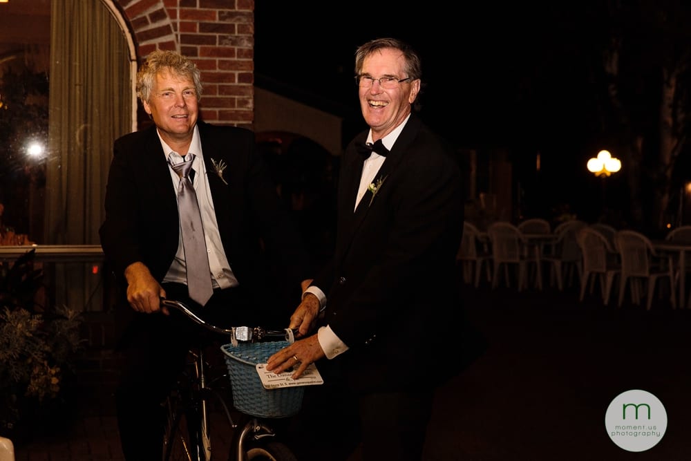 fathers standing with bike