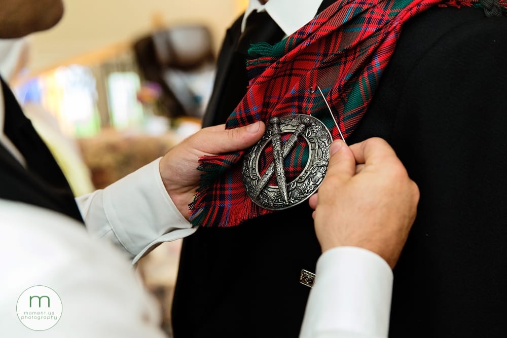 Cornwall Rustic Country Wedding tartan being pinned