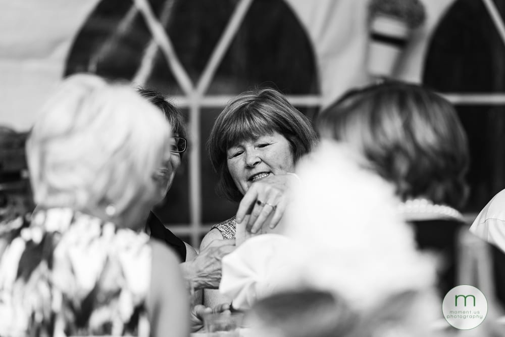 Cornwall Rustic Country Wedding - guest pointing at photo