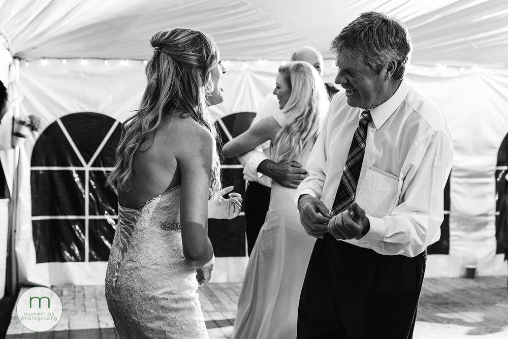 Cornwall Rustic Country Wedding - bride doing air guitar with dad