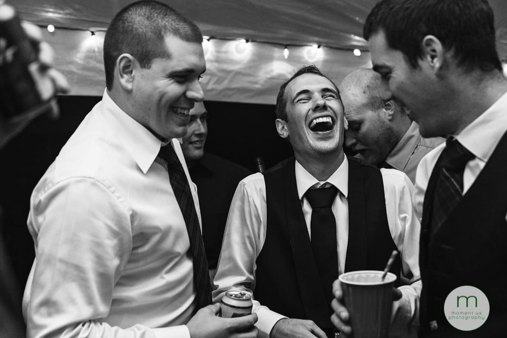 Cornwall Rustic Country Wedding - groom laughing with friends