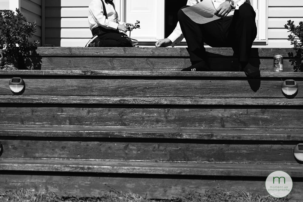 ring bearer and groomsman on front steps