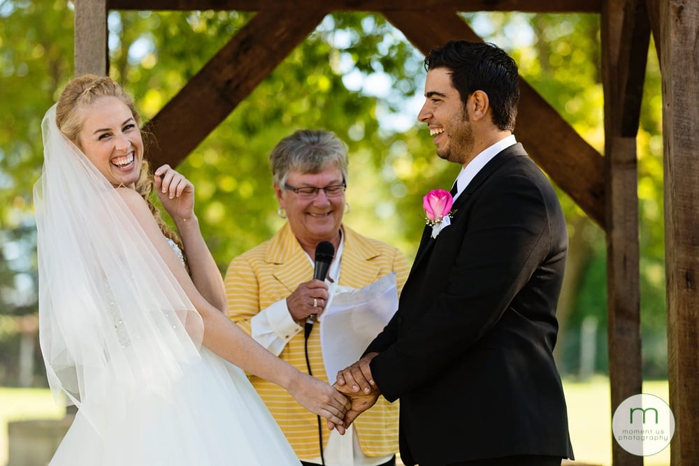 bride laughing during Maxville Fairground wedding ceremony