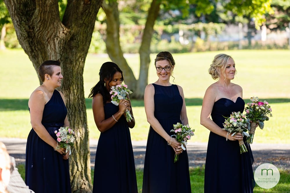bridesmaid hiding in flowers
