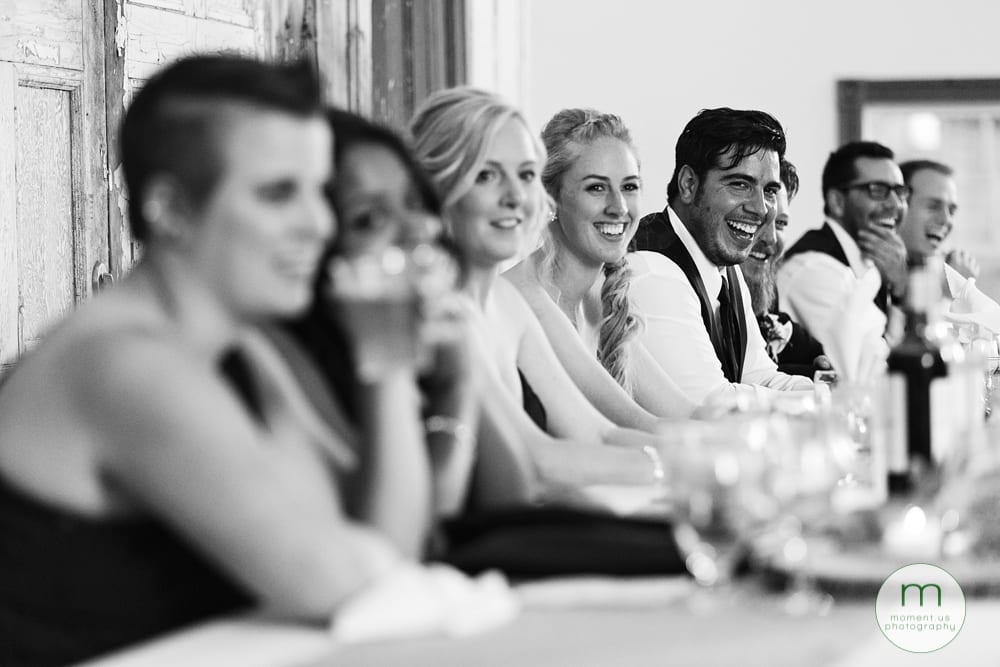 bride and groom laughing