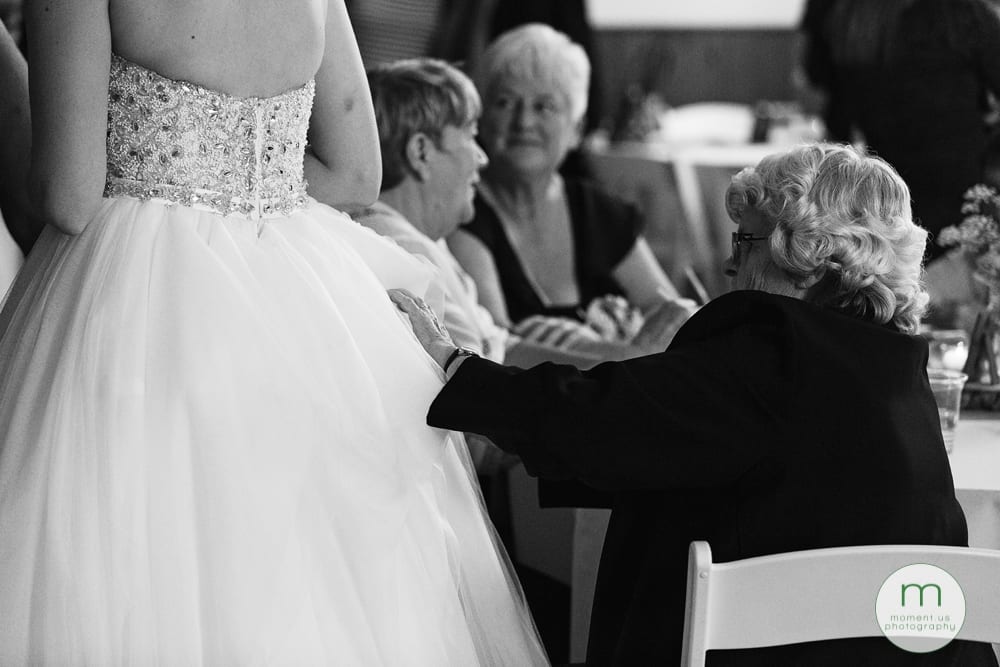 elderly woman fixing dress